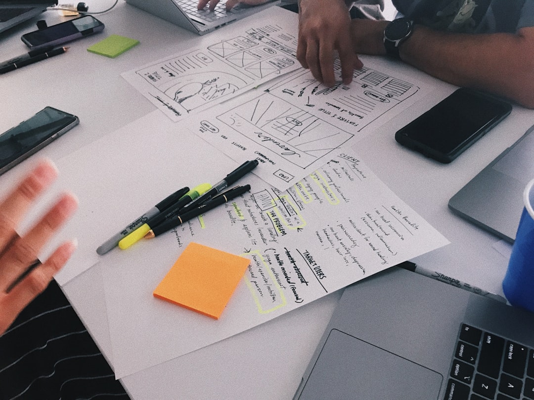 get-in-touch man-sitting-near-table-um4ib59ls2a